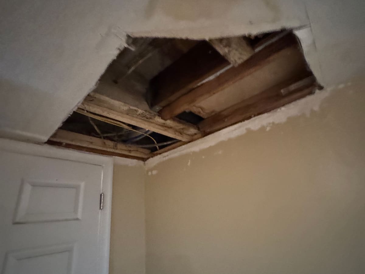 Hole in a ceiling opened up for repair