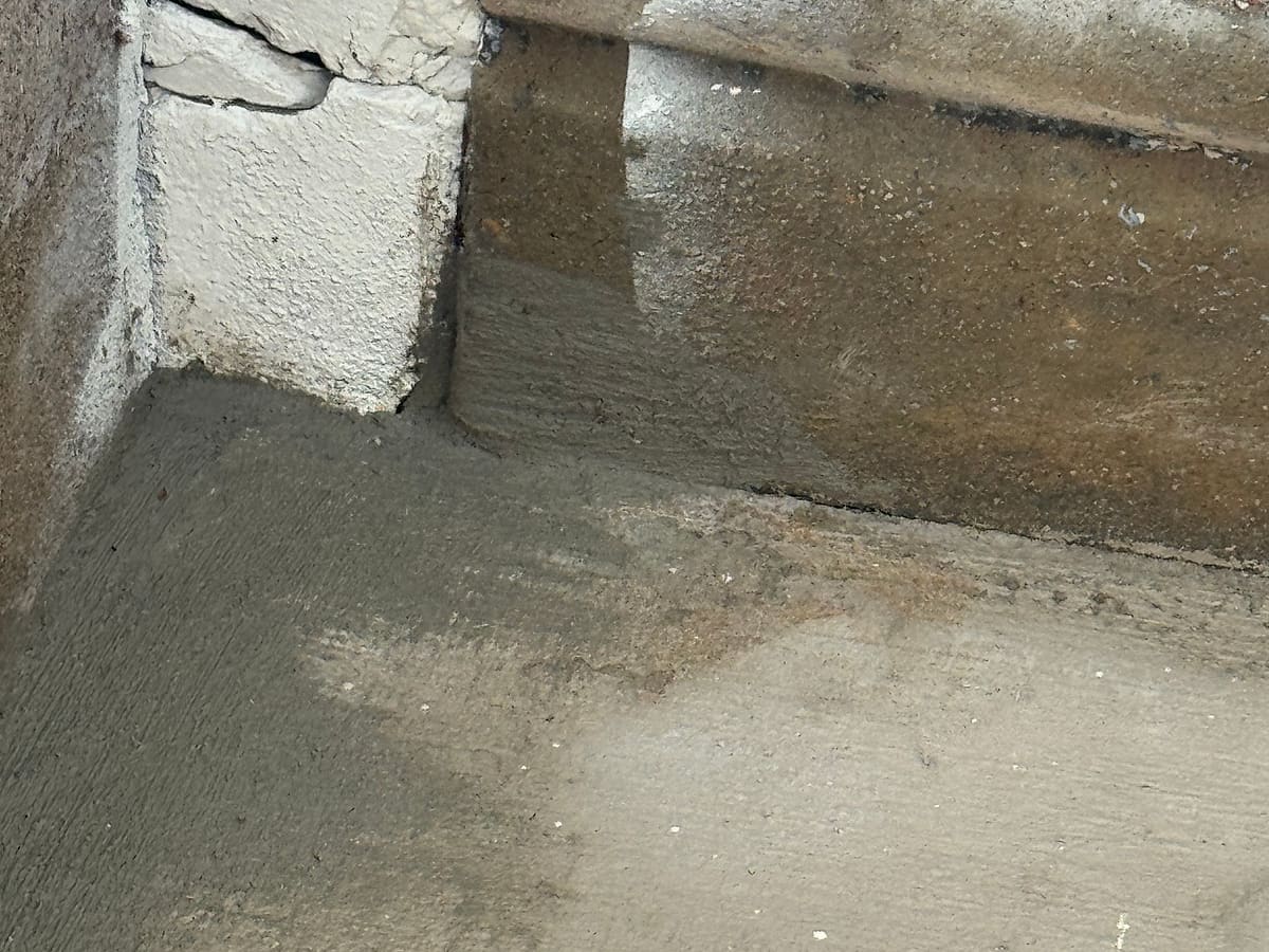 Rebuilt and resurfaced concrete step